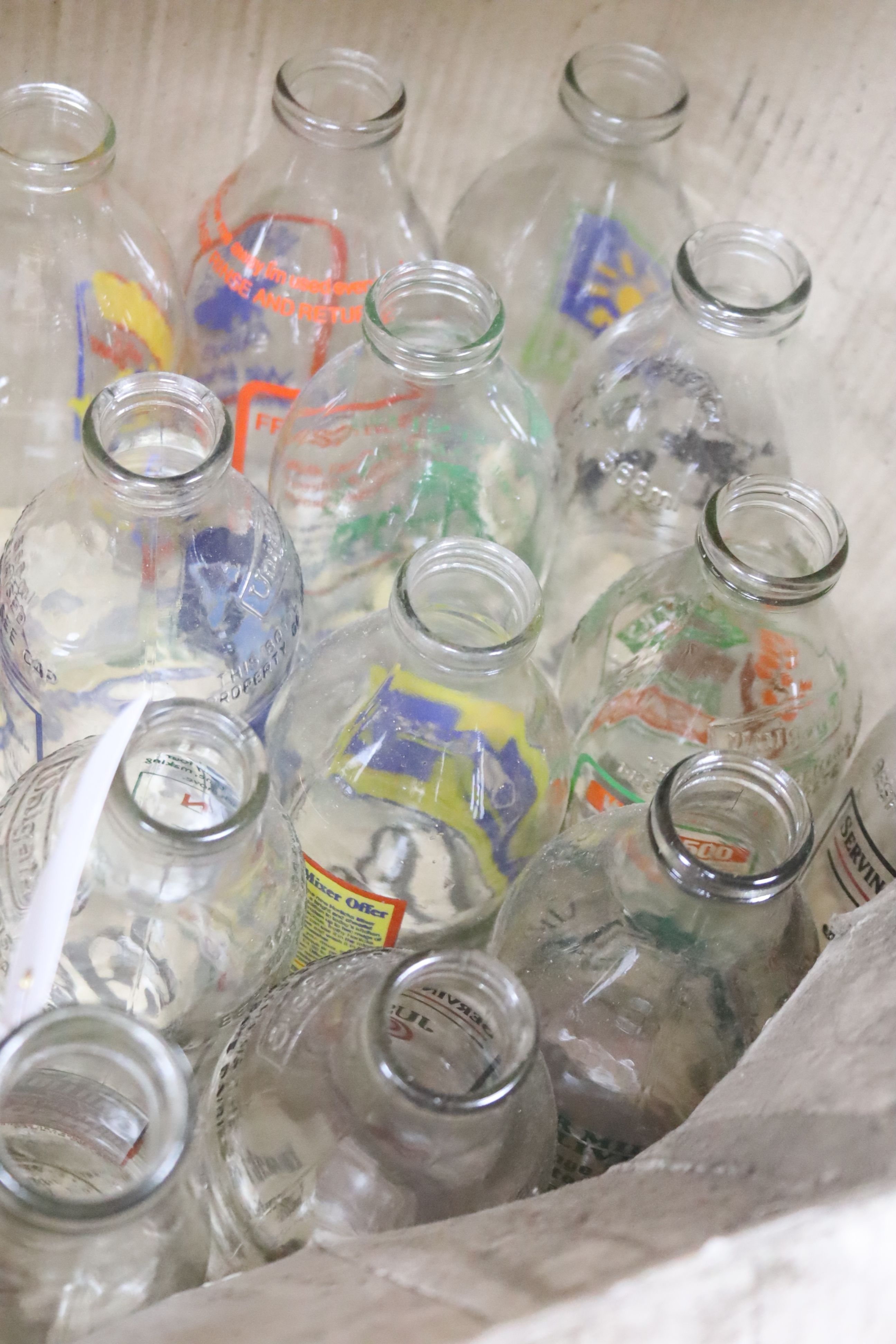 A large collection of branded milk bottles 1970s or later